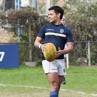 Foto de perfil de Dylan cuenca: jugando al rugby con la pelota en la mano